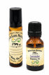 glass amber roller bottle and lavender essential oil in glass amber bottle.