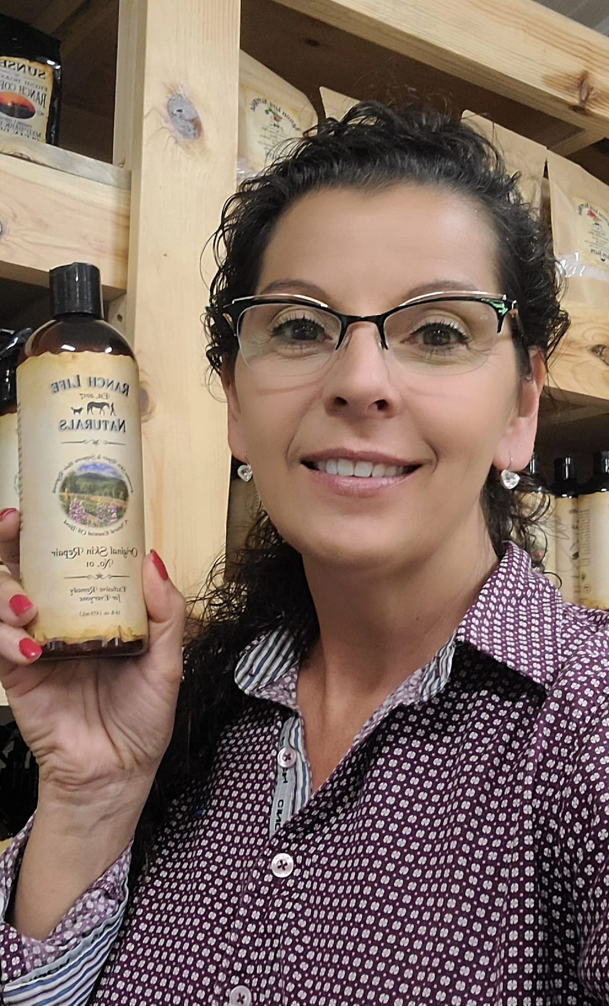Woman holding a bottle of Original Skin Repair No. 01
