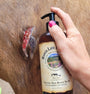 Original Skin Repair No. 01 bottle beside an affected skin area on a horse.